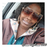 Bourgeois Pineapples owner Ayesha Clarke wearing tan/brown retro large frame oversize fashion sunglasses